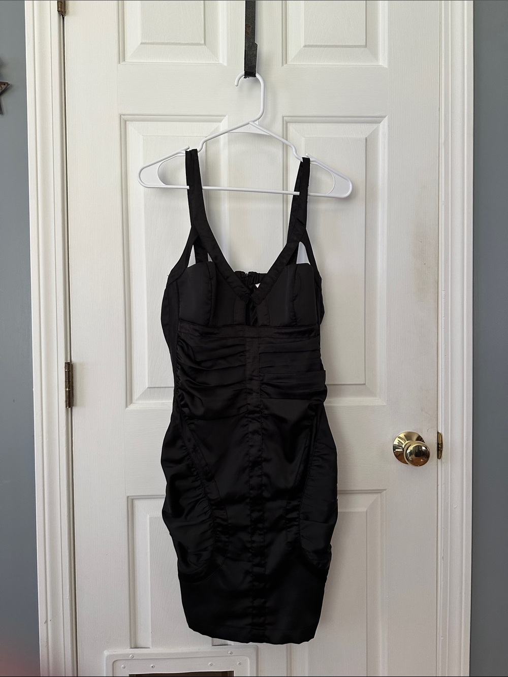 Sleek Black Satin Ruched Mini Dress with Structured Bust